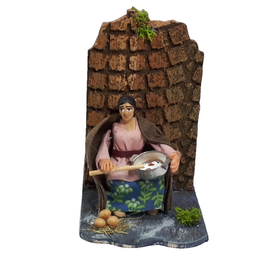 SIGNORA CON PADELLA IN MOVIMENTO CM 7